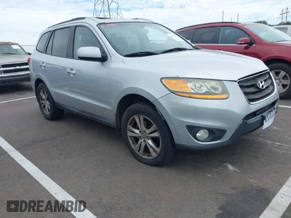 2010 Hyundai Santa Fe Limited with VIN 5NMSKDAG4AH341859, listed as a IAAI auction lot 43487646 with 169,452 mi miles and . Bid and sale history available at DreamBid. Image 1.