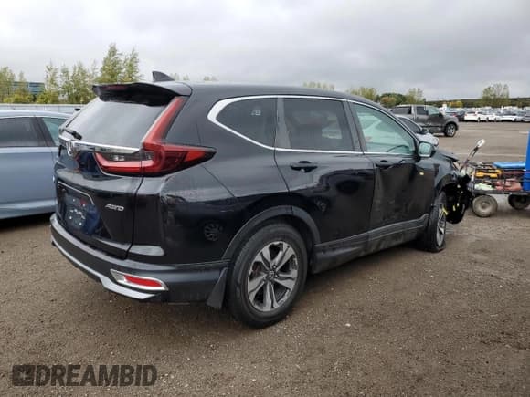 ✅ 2021 Honda CR-V LX • VIN: 2HKRW2H26MH212613 • Lot: 85569795. Listed on Copart with 54,951 mi. Free auction sales archive from the USA and detailed vehicle history report at DreamBid. Image 3.