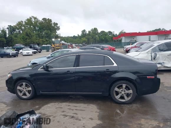 ✅ 2009 Chevrolet Malibu 2LT • VIN: 1G1ZJ57B294153177 • Lot: 43242241. Listed on IAAI with 210,315 mi. Free auction sales archive from the USA and detailed vehicle history report at DreamBid. Image 14.
