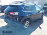 ✅ 2015 Jeep Cherokee Latitude • VIN: 1C4PJMCS4FW704305 • Lot: 42100291. Listed on IAAI with 162,117 mi. Free auction sales archive from the USA and detailed vehicle history report at DreamBid. Image 4.