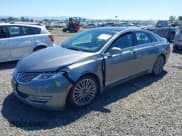 ✅ 2014 Lincoln MKZ • VIN: 3LN6L2JK3ER833842 • Лот: 42371576. Опубликован ранее на IAAI с пробегом 87 894 миль. Бесплатный доступ к архиву аукционных продаж из США и подробный отчёт об истории автомобиля на DreamBid. Изображение 2.