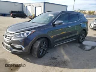 ✅ 2018 Hyundai Santa Fe Ultimate • VIN: 5XYZW4LA9JG571273 • Лот: 82132553. Опубликован ранее на Copart с пробегом 34 774 миль. Бесплатный доступ к архиву аукционных продаж из США и подробный отчёт об истории автомобиля на DreamBid. Изображение 1.