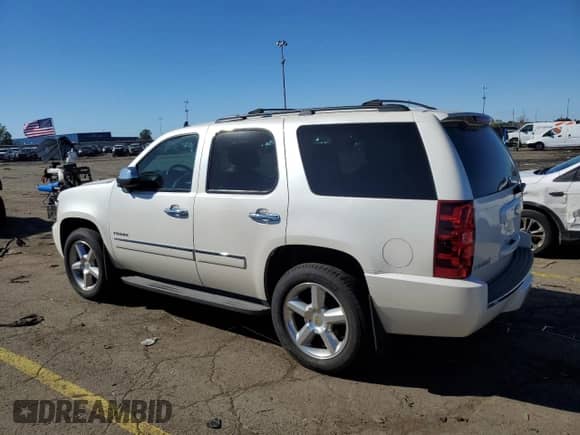 2013 Chevrolet Tahoe LTZ with VIN 1GNSKCE09DR110650, listed as a Copart auction lot 82342915 with 107,934 mi miles and Clean title. Bid and sale history available at DreamBid. Image 2.