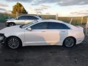 ✅ 2018 Lincoln MKZ Hybrid Select • VIN: 3LN6L5LU2JR608855 • Lot: 43803395. Wystawiony na IAAI z przebiegiem 211 747 mil. Bezpłatny archiwum sprzedaży aukcyjnych z USA i szczegółowy raport historii pojazdu na DreamBid. Zdjęcie 15.
