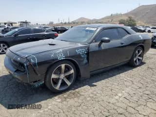 2014 Dodge Challenger R/T Plus z VIN 2C3CDYBT1EH294121, wystawiony jako Copart lot #60687575 z przebiegiem 121 607 mil mil oraz Szkoda całkowita • Salvage title. Historia ofert i sprzedaży dostępna na DreamBid. Obrazek 1.