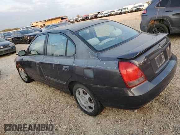 2003 Hyundai Elantra GLS z VIN KMHDN45D53U572664, wystawiony jako Copart lot #82387214 z przebiegiem Nie podano mil oraz Szkoda całkowita • Salvage title. Historia ofert i sprzedaży dostępna na DreamBid. Obrazek 2.