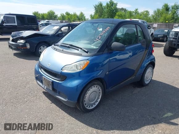 ✅ 2009 Smart fortwo Pure • VIN: WMEEJ31X49K309473 • Lot: 42714704. Listed on IAAI with 30,176 mi. Free auction sales archive from the USA and detailed vehicle history report at DreamBid. Image 2.