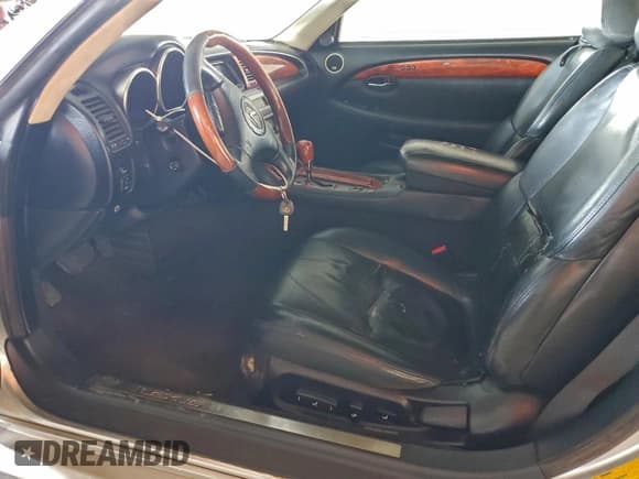 ✅ 2003 Lexus SC 430 • VIN: JTHFN48Y730039474 • Lot: 95133405. Wystawiony na Copart z przebiegiem 293 222 mil. Bezpłatny archiwum sprzedaży aukcyjnych z USA i szczegółowy raport historii pojazdu na DreamBid. Zdjęcie 7.