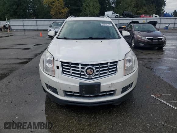 ✅ 2013 Cadillac SRX Premium Collection • VIN: 3GYFNJE37DS642647 • Лот: 91599445. Опубликован ранее на Copart с пробегом 146 632 миль. Бесплатный доступ к архиву аукционных продаж из США и подробный отчёт об истории автомобиля на DreamBid. Изображение 5.