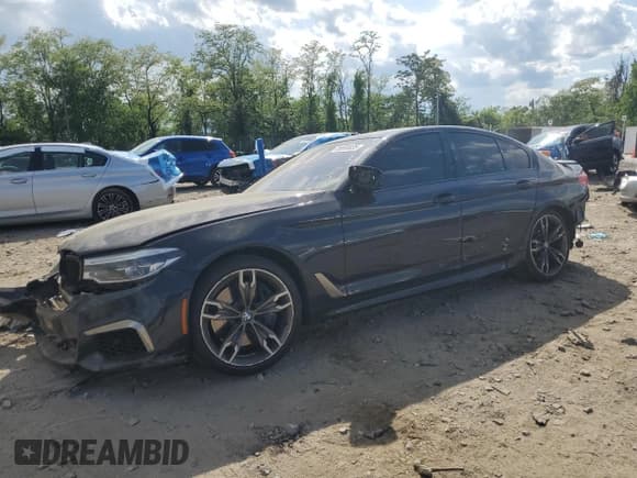 ✅ 2020 BMW 5 Series M550i xDrive • VIN: WBAJS7C03LCD00279 • Lot: 55698035. Wystawiony na Copart z przebiegiem 76 057 mil. Bezpłatny archiwum sprzedaży aukcyjnych z USA i szczegółowy raport historii pojazdu na DreamBid. Zdjęcie 1.