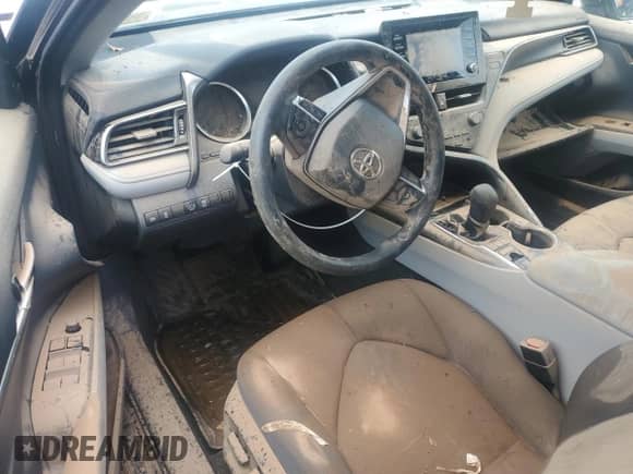 2023 Toyota Camry LE z VIN 4T1C11BK6PU102562, wystawiony jako Copart lot #65087875 z przebiegiem Nie podano mil oraz Szkoda całkowita • Salvage title. Historia ofert i sprzedaży dostępna na DreamBid. Obrazek 8.