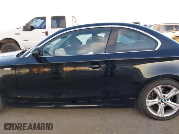 ✅ 2013 BMW 1 Series 128i • VIN: WBAUP9C53DVS95917 • Lot: 41398338. Listed on IAAI with 52,160 mi. Free auction sales archive from the USA and detailed vehicle history report at DreamBid. Image 15.