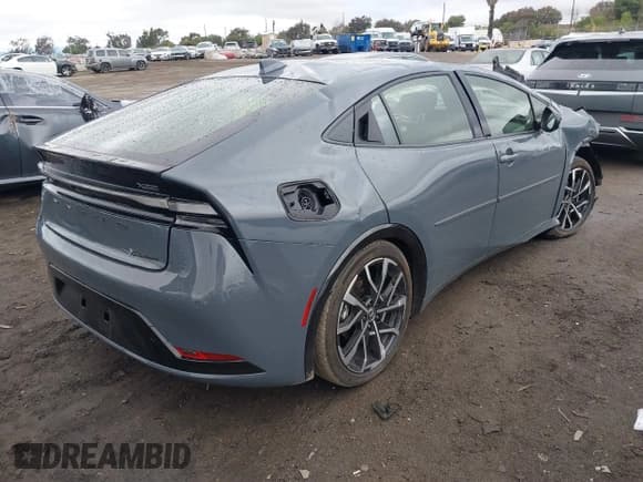 ✅ 2024 Toyota Prius SE • VIN: JTDACACUXR3012801 • Lot: 41523581. Listed on IAAI with 14,684 mi. Free auction sales archive from the USA and detailed vehicle history report at DreamBid. Image 4.