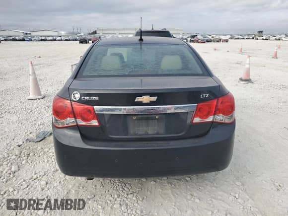 2012 Chevrolet Cruze LTZ z VIN 1G1PH5SC6C7170945, wystawiony jako Copart lot #89626035 z przebiegiem 172 658 mil mil oraz Szkoda całkowita • Salvage title. Historia ofert i sprzedaży dostępna na DreamBid. Obrazek 6.