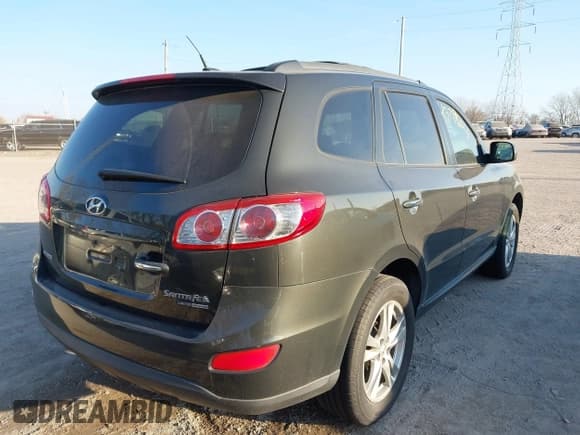 ✅ 2011 Hyundai Santa Fe Limited • VIN: 5XYZKDAG3BG052854 • Лот: 43718015. Опубликован ранее на IAAI с пробегом 246 085 миль. Бесплатный доступ к архиву аукционных продаж из США и подробный отчёт об истории автомобиля на DreamBid. Изображение 4.
