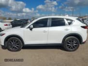 ✅ 2018 Mazda CX-5 Touring • VIN: JM3KFACM6J1409067 • Лот: 43716812. Опубликован ранее на IAAI с пробегом 76 489 миль. Бесплатный доступ к архиву аукционных продаж из США и подробный отчёт об истории автомобиля на DreamBid. Изображение 14.