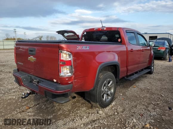 ✅ 2015 Chevrolet Colorado 4WD Z71 • VIN: 1GCGTCE38F1129942 • Лот: 72464803. Опубликован ранее на Copart с пробегом 142 334 миль. Бесплатный доступ к архиву аукционных продаж из США и подробный отчёт об истории автомобиля на DreamBid. Изображение 3.