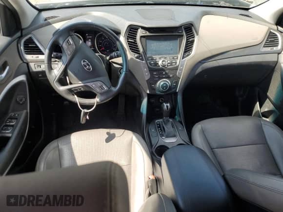 2014 Hyundai Santa Fe с VIN 5XYZU3LAXEG206428, выставлен на аукционе Copart как лот 71009555 с пробегом 56 183 миль миль и На запчасти • Non repairable. История ставок и продаж доступна на DreamBid. Изображение 8.