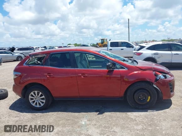 ✅ 2011 Mazda CX-7 i SV • VIN: JM3ER2A58B0397310 • Лот: 42575416. Опубликован ранее на IAAI с пробегом 122 568 миль. Бесплатный доступ к архиву аукционных продаж из США и подробный отчёт об истории автомобиля на DreamBid. Изображение 13.