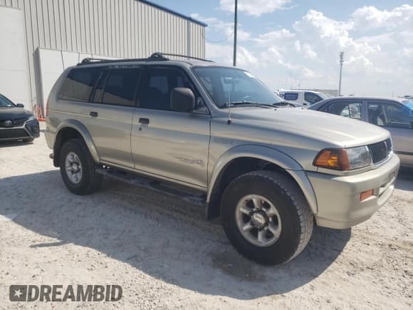 ✅ 1999 Mitsubishi Montero Sport LS • VIN: JA4LS31H8XP026225 • Лот: 71874604. Опубликован ранее на Copart с пробегом 243 182 миль. Бесплатный доступ к архиву аукционных продаж из США и подробный отчёт об истории автомобиля на DreamBid. Изображение 4.