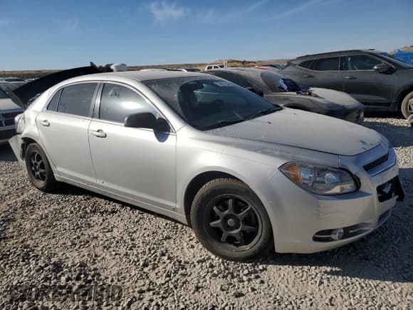 ✅ 2010 Chevrolet Malibu 1FL • VIN: 1G1ZA5E02AF106290 • Lot: 74611934. Listed on Copart with 143,823 mi. Free auction sales archive from the USA and detailed vehicle history report at DreamBid. Image 4.
