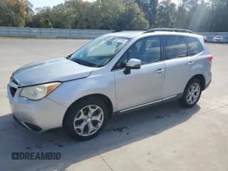 ✅ 2015 Subaru Forester Touring • VIN: JF2SJAWCXFH495252 • Lot: 92071515. Listed on Copart with 142,081 mi. Free auction sales archive from the USA and detailed vehicle history report at DreamBid. Image 1.