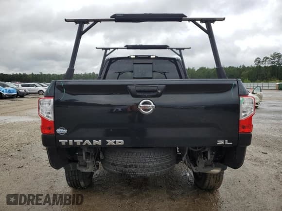 ✅ 2017 Nissan Titan SV • VIN: 1N6AA1F22HN564244 • Лот: 85832545. Опубликован ранее на Copart с пробегом 55 592 миль. Бесплатный доступ к архиву аукционных продаж из США и подробный отчёт об истории автомобиля на DreamBid. Изображение 6.
