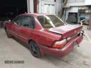 ✅ 1997 Toyota Corolla DX • VIN: 1NXBB02E2VZ601840 • Lot: 43774906. Listed on IAAI with 169,903 mi. Free auction sales archive from the USA and detailed vehicle history report at DreamBid. Image 3.