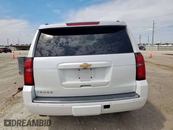 2016 Chevrolet Tahoe LTZ с VIN 1GNSKCKC6GR264493, выставлен на аукционе Copart как лот 84283015 с пробегом 142 412 миль миль и Списание • Salvage title. История ставок и продаж доступна на DreamBid. Изображение 6.