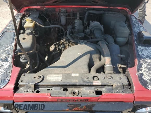 ✅ 1993 Land Rover Defender • VIN: SALLDHMF7KA927338 • Lot: 66273035. Listed on Copart with 160,883 mi. Free auction sales archive from the USA and detailed vehicle history report at DreamBid. Image 12.