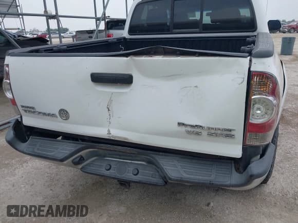 ✅ 2015 Toyota Tacoma PreRunner • VIN: 5TFJU4GN6FX070412 • Lot: 42308629. Listed on IAAI with 103,972 mi. Free auction sales archive from the USA and detailed vehicle history report at DreamBid. Image 6.