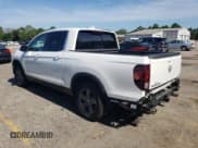 ✅ 2023 Honda Ridgeline RTL • VIN: 5FPYK3F55PB025285 • Лот: 64745865. Опубликован ранее на Copart с пробегом 43 853 миль. Бесплатный доступ к архиву аукционных продаж из США и подробный отчёт об истории автомобиля на DreamBid. Изображение 2.