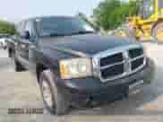 2007 Dodge Dakota SLT with VIN 1D7HW48K97S138512, listed as a IAAI auction lot 42386042 with 146,629 mi miles and . Bid and sale history available at DreamBid. Image 1.