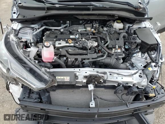 ✅ 2023 Toyota Corolla Cross Hybrid S • VIN: 7MUFBABG9PV009474 • Lot: 69666115. Wystawiony na Copart z przebiegiem 12 804 mil. Bezpłatny archiwum sprzedaży aukcyjnych z USA i szczegółowy raport historii pojazdu na DreamBid. Zdjęcie 12.