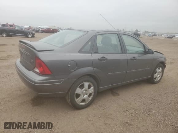 ✅ 2004 Ford Focus ZTS • VIN: 1FAFP38ZX4W137160 • Lot: 65343105. Listed on Copart with 122,150 mi. Free auction sales archive from the USA and detailed vehicle history report at DreamBid. Image 3.