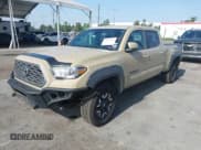 ✅ 2020 Toyota Tacoma SR5 • VIN: 5TFDZ5BN7LX052976 • Лот: 42626487. Опубликован ранее на IAAI с пробегом 80 641 миль. Бесплатный доступ к архиву аукционных продаж из США и подробный отчёт об истории автомобиля на DreamBid. Изображение 2.