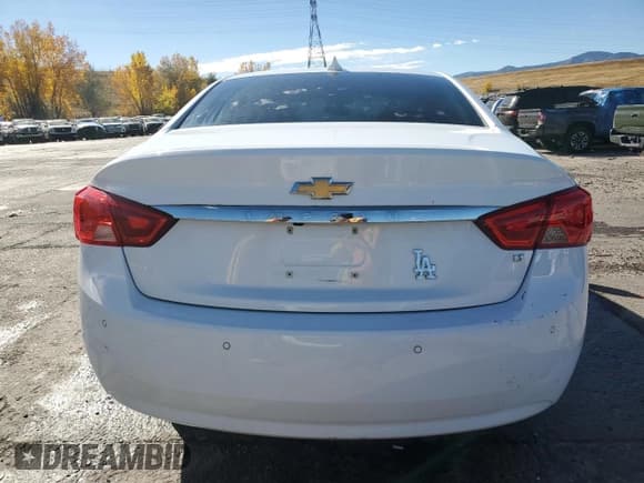 ✅ 2016 Chevrolet Impala LT • VIN: 2G1105SA4G9184570 • Лот: 77461884. Опубликован ранее на Copart с пробегом 97 085 миль. Бесплатный доступ к архиву аукционных продаж из США и подробный отчёт об истории автомобиля на DreamBid. Изображение 6.