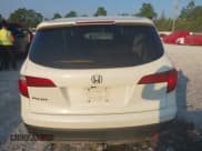 ✅ 2017 Honda Pilot EX-L • VIN: 5FNYF5H7XHB014193 • Lot: 43040443. Listed on IAAI with 246,920 mi. Free auction sales archive from the USA and detailed vehicle history report at DreamBid. Image 16.