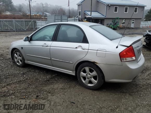 ✅ 2009 Kia Spectra EX • VIN: KNAFE222795027263 • Lot: 93812205. Listed on Copart with 164,002 mi. Free auction sales archive from the USA and detailed vehicle history report at DreamBid. Image 2.