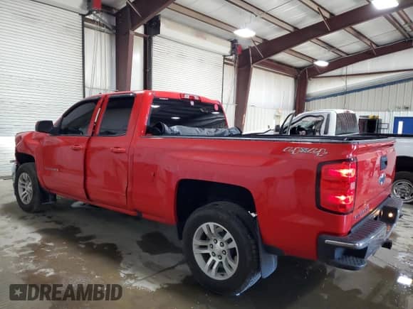 2017 Chevrolet Silverado 1500 LT with VIN 1GCVKREC0HZ127281, listed as a Copart auction lot 80011015 with 57,908 mi miles and Salvage title. Bid and sale history available at DreamBid. Image 2.