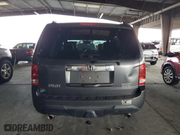 ✅ 2013 Honda Pilot Touring • VIN: 5FNYF4H97DB046413 • Lot: 92087595. Wystawiony na Copart z przebiegiem 130 927 mil. Bezpłatny archiwum sprzedaży aukcyjnych z USA i szczegółowy raport historii pojazdu na DreamBid. Zdjęcie 6.