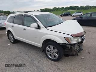 ✅ 2013 Dodge Journey Crew • VIN: 3C4PDCDGXDT590454 • Lot: 42551911. Wystawiony na IAAI z przebiegiem 141 282 mil. Bezpłatny archiwum sprzedaży aukcyjnych z USA i szczegółowy raport historii pojazdu na DreamBid. Zdjęcie 1.