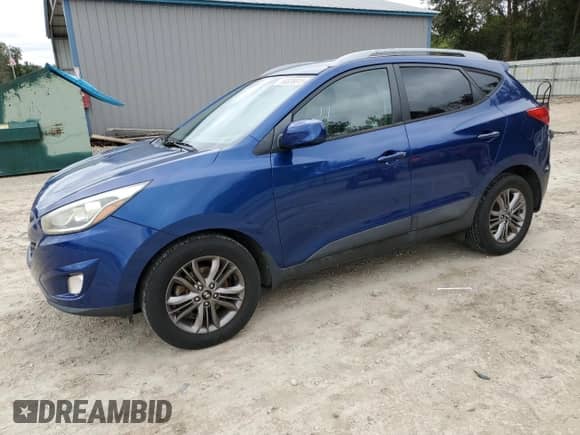 2014 Hyundai Tucson Limited with VIN KM8JU3AGXEU799903, listed as a Copart auction lot 90336815 with 82,303 mi miles and Salvage title. Bid and sale history available at DreamBid. Image 1.
