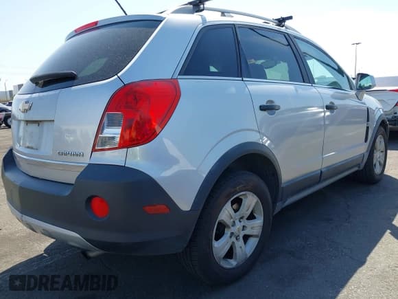 ✅ 2013 Chevrolet Captiva Sport LS • VIN: 3GNAL2EK2DS575448 • Lot: 41979847. Wystawiony na IAAI z przebiegiem 103 199 mil. Bezpłatny archiwum sprzedaży aukcyjnych z USA i szczegółowy raport historii pojazdu na DreamBid. Zdjęcie 4.