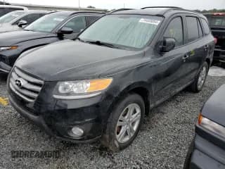 ✅ 2012 Hyundai Santa Fe SE • VIN: 5XYZH4AG1CG164374 • Lot: 74459054. Listed on Copart with Not provided. Free auction sales archive from the USA and detailed vehicle history report at DreamBid. Image 1.