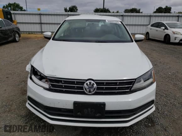 ✅ 2018 Volkswagen Jetta S • VIN: 3VW167AJ0JM228787 • Lot: 56602225. Listed on Copart with 70,949 mi. Free auction sales archive from the USA and detailed vehicle history report at DreamBid. Image 5.
