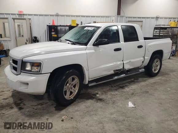 2008 Dodge Dakota Bighorn/Lonestar with VIN 1D7HE38K88S590577, listed as a Copart auction lot 73517754 with 128,163 mi miles and Salvage title. Bid and sale history available at DreamBid. Image 1.