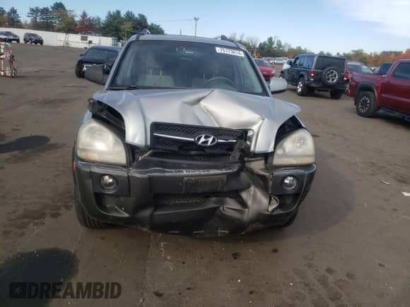 2005 Hyundai Tucson GLS z VIN KM8JN72D75U080052, wystawiony jako Copart lot #75173014 z przebiegiem 106 479 mil mil oraz Szkoda całkowita • Salvage title. Historia ofert i sprzedaży dostępna na DreamBid. Obrazek 5.