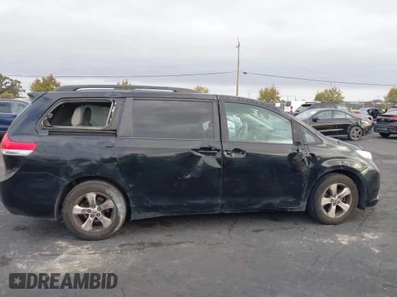 ✅ 2013 Toyota Sienna LE AAS • VIN: 5TDKK3DC0DS318471 • Lot: 43518030. Listed on IAAI with 199,893 mi. Free auction sales archive from the USA and detailed vehicle history report at DreamBid. Image 13.