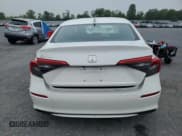 ✅ 2023 Honda Civic LX • VIN: 2HGFE2F27PH105738 • Lot: 57242805. Wystawiony na Copart z przebiegiem 11 485 mil. Bezpłatny archiwum sprzedaży aukcyjnych z USA i szczegółowy raport historii pojazdu na DreamBid. Zdjęcie 6.